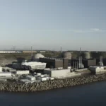 Arrêt EPR Flamanville : vue de la centrale nucléaire et du réacteur 3 au premier plan