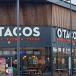 Façade et terrasse d’un restaurant O’Tacos à Haguenau.